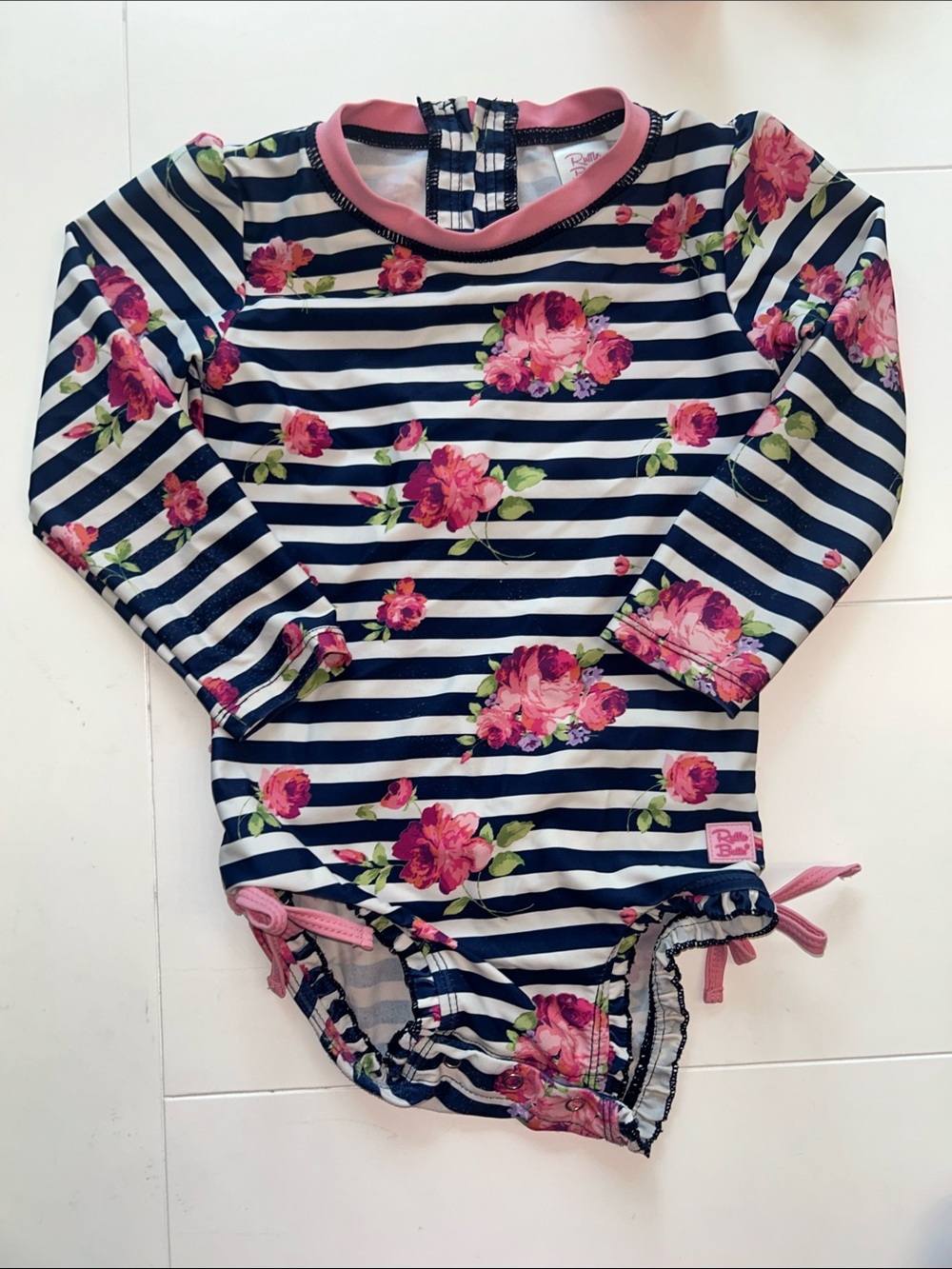 Ruffle Butts Navy Stripe One-Piece with Pink Floral Print